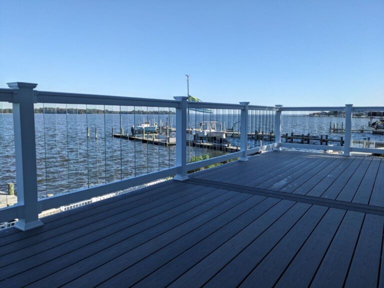 glass vinyl deck railings showing waterfront view